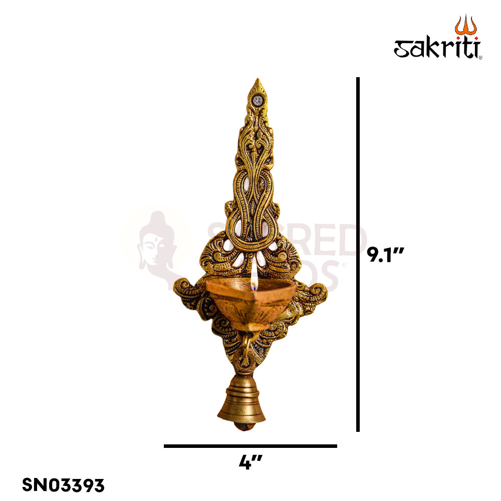 Sacred Needs Brass Wall Mount Deepam with Bell – 9.1 Inch (23.1 cm) Height | Traditional Brass Diya Wall Hanging for Pooja Room & Temple