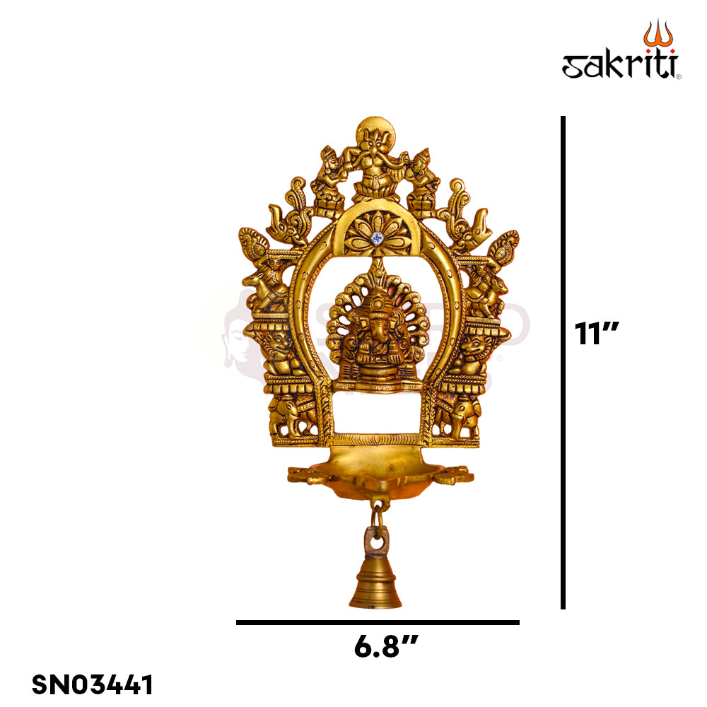 Sacred Needs Brass Wall Mounted Ganesh Deepam with Frame – 11 Inch (27.9 cm) Height | Ganesha Oil Lamp Wall Hanging for Pooja Room & Temple