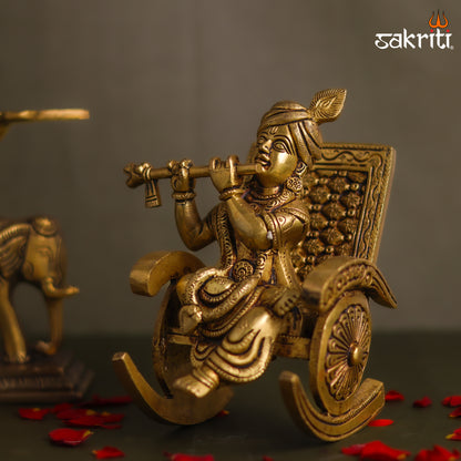 Sacred Needs Brass Chair Krishna Idol – 5.2 Inch (13.2 cm) Height | Lord Krishna Sitting on Chair Statue for Pooja Room, Temple & Home Décor