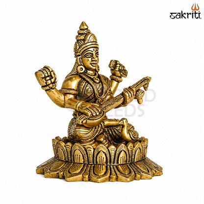 Sacred Needs Brass Lotus Saraswathi Idol – 5.5 Inch (14 cm) Height | Goddess Saraswati Statue for Education, Wisdom & Pooja Décor