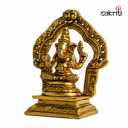 Brass Ganesha Idol with Decorative Arch – 5.3 Inch (13.5 cm) Height | Traditional Lord Ganesha Statue for Home Temple & Pooja Room.