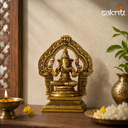Brass Ganesha Idol with Decorative Arch – 5.3 Inch (13.5 cm) Height | Traditional Lord Ganesha Statue for Home Temple & Pooja Room.