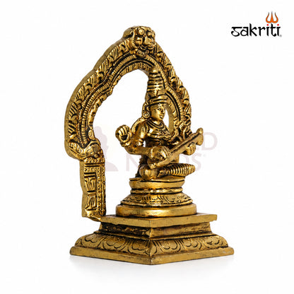 Brass Saraswathi Idol with Arch – 5.2 Inch (13.2 cm) Height | Goddess Saraswati Statue for Pooja Room, Home Temple & Study Room Décor.