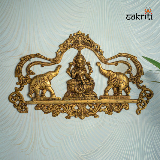 Sacred Needs Brass Gajalakshmi Plate Wall Mount – 11.2 Inch (28.4 cm) Height | Decorative Goddess Lakshmi Wall Hanging for Pooja Room & Home Décor