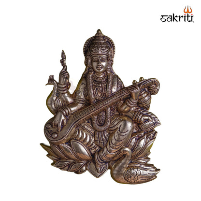 Sacred Needs Brass Saraswathi Wall Mount – 11 Inch (27.9 cm) Height | Goddess Saraswathi with Lotus & Swan Brass Wall Hanging for Pooja Room & Home Décor