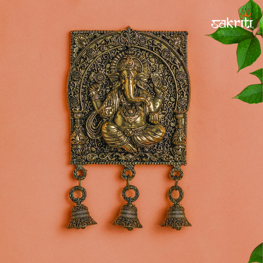 Sacred Needs Brass WC Ganesha Wall Mount with Bell – 7.2 Inch (18.3 cm) Height | Brass Ganesha Wall Hanging for Pooja Room & Home Décor