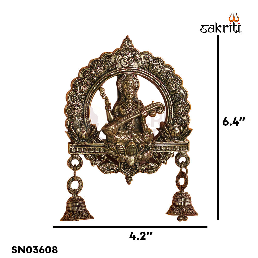 Sacred Needs Brass Saraswathi Wall Mount with Frame & Bell – 6.4 Inch (16.3 cm) Height | Goddess Saraswathi Wall Hanging for Pooja Room & Home Décor