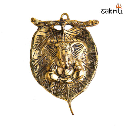 Sacred Needs Brass Stem Leaf Ganesha Wall Mount – 8 Inch (20.3 cm) Height | Decorative Lord Ganesha Brass Wall Hanging for Pooja Room & Home Décor