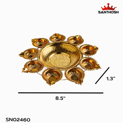 Sacred Needs Brass Urli with 9 Deepam – 1.3 Inch (3.3 cm) Height | Traditional Brass Urli Bowl with 9 Oil Lamps for Pooja, Festivals & Home Decor