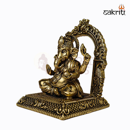 Sacred Needs Brass Ganesha with Arch Idol – 3.8 Inch (9.7 cm) Height | Decorative Ganesha Statue for Pooja & Home Temple