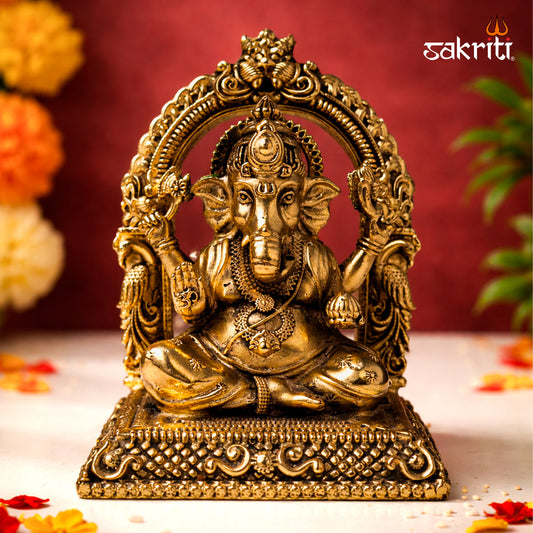 Sacred Needs Brass Ganesha with Arch Idol – 3.8 Inch (9.7 cm) Height | Decorative Ganesha Statue for Pooja & Home Temple