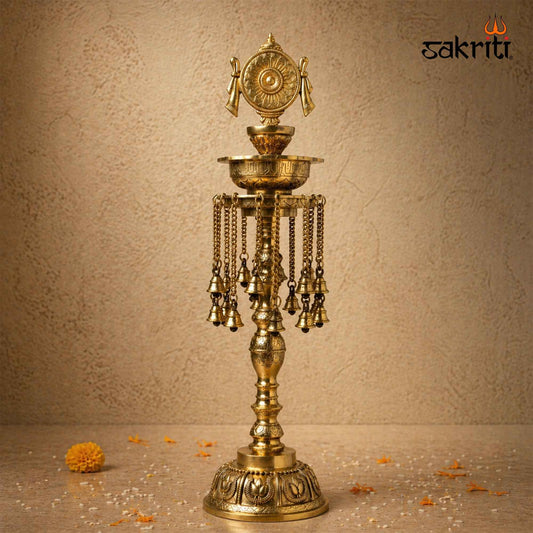Sacred Needs Brass Chakra Lamp with Bell – 30 Inch (76.2 cm) Height | Traditional Brass Deepam for Temple, Pooja & Festive Décor