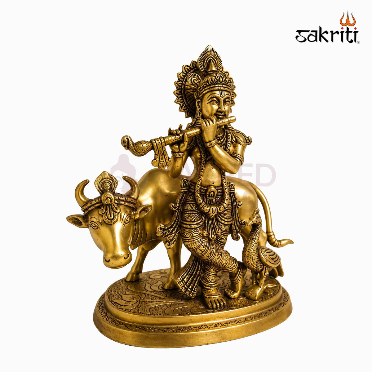 Sacred Needs Brass Cow Krishna with Peacock Idol – 9.5 Inch (24.1 cm) Height | Krishna Cow Statue for Pooja Room, Home Temple & Décor