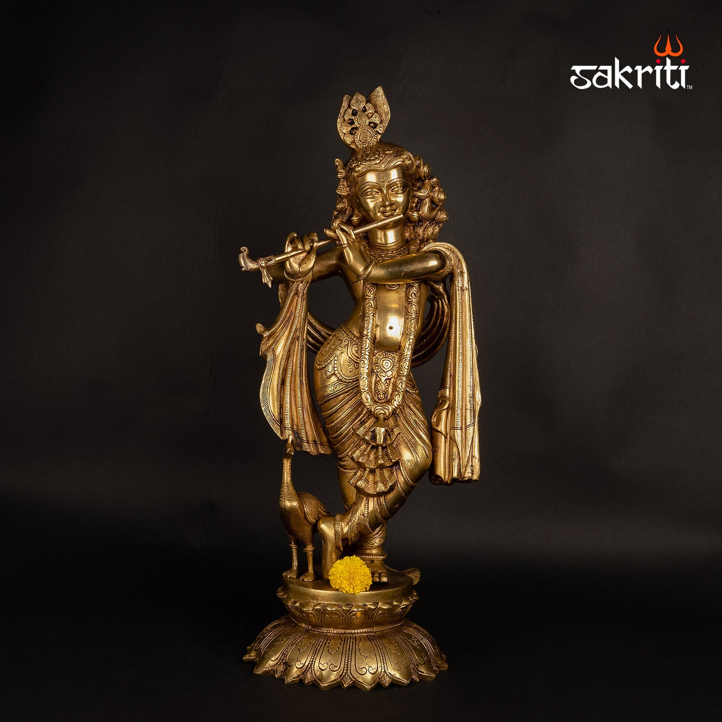 BRASS KRISHNA WITH PEACOCK