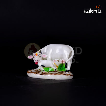 MARBLE DUST COW AND CALF