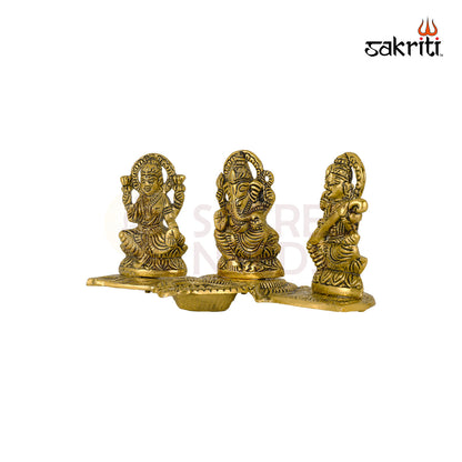 ALUMINIUM LAKSHMI-GANESHA-SARASWATI WITH DEEPAM