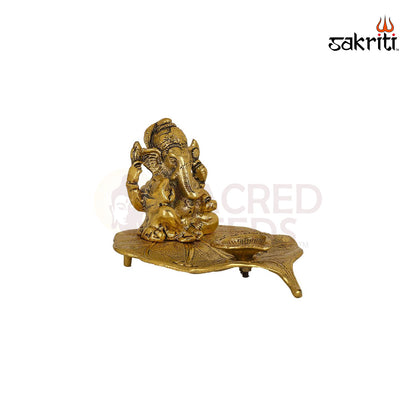 ALUMINIUM LEAF GANESHA WITH DEEPAM