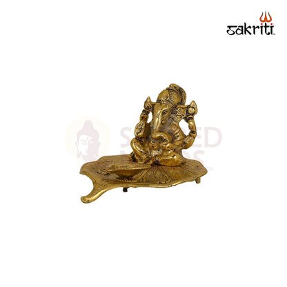 ALUMINIUM LEAF GANESHA WITH DEEPAM