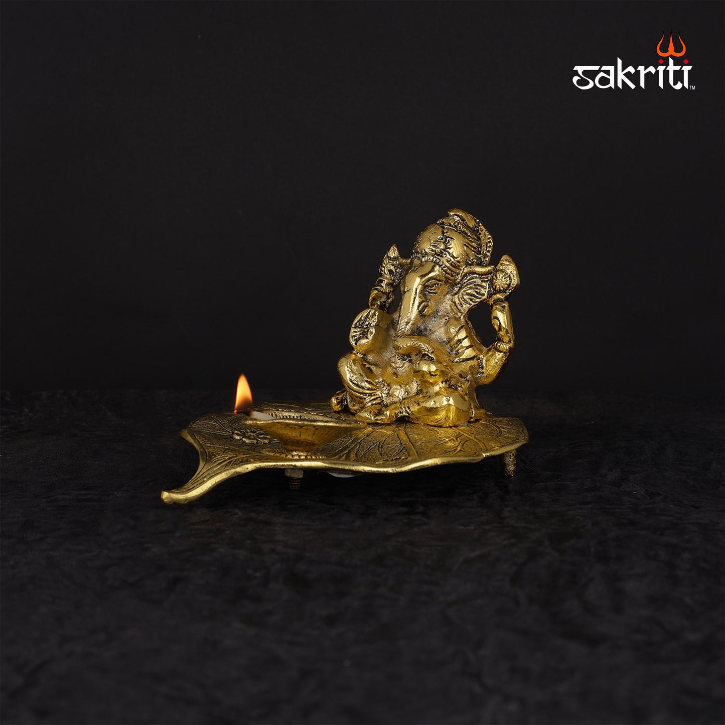 ALUMINIUM LEAF GANESHA WITH DEEPAM