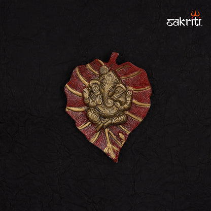 ALUMINIUM RED LEAF GANESHA MOUNTED