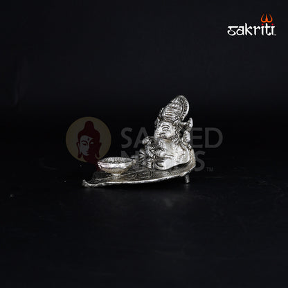 ALUMINIUM LEAF GANESHA WITH DEEPAM