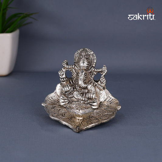 ALUMINIUM LEAF GANESHA WITH DEEPAM