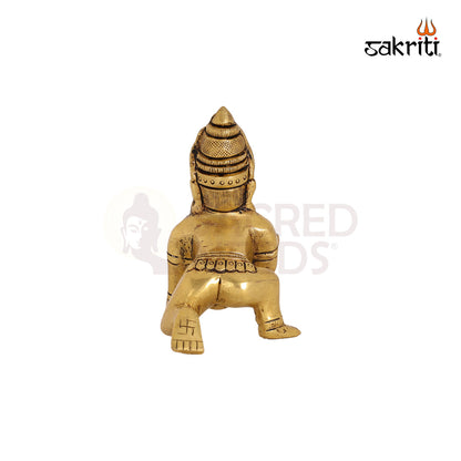 BRASS KRISHNA WITH LADOO