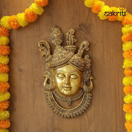 BRASS KRISHNA HEAD WALL MOUNTED PLATE