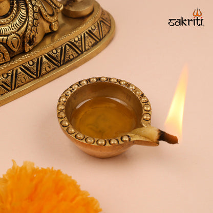 BRASS DOTTED SWASTI DEEPAM